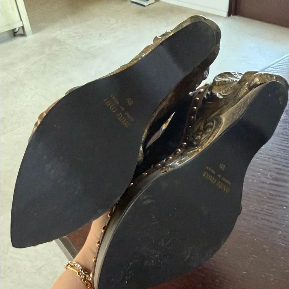 Miu Miu Black Heels with Sculpted Gold Accents